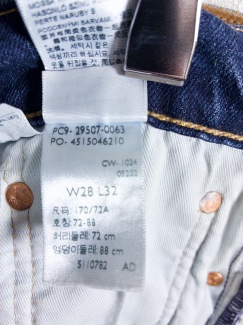 Levi’s - 502 色落ちとアタリが映えるローライズスリムテーパード