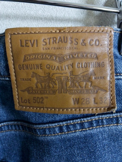 Levi’s - 502 色落ちとアタリが映えるローライズスリムテーパード