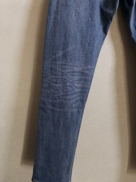 Levi’s - 502 色落ちとアタリが映えるローライズスリムテーパード