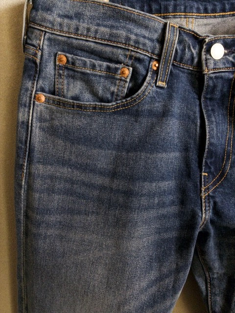 Levi’s - 502 色落ちとアタリが映えるローライズスリムテーパード