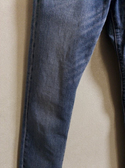 Levi’s - 502 色落ちとアタリが映えるローライズスリムテーパード