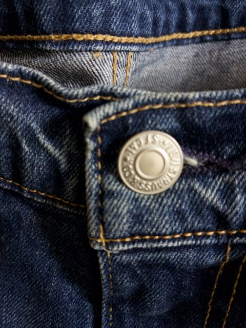 Levi’s - 502 色落ちとアタリが映えるローライズスリムテーパード